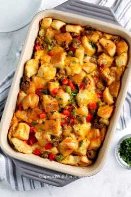 baked Sausage Cheddar Breakfast Strata in the dish