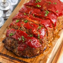 The Best Meatloaf Recipe sliced on a cutting board