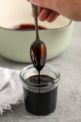 balsamic in a small jar with a spoon