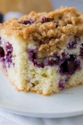 closeup of blueberry buckle with a bite out of it
