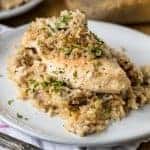 Chicken & Rice Casserole on a plate garnished with parsley