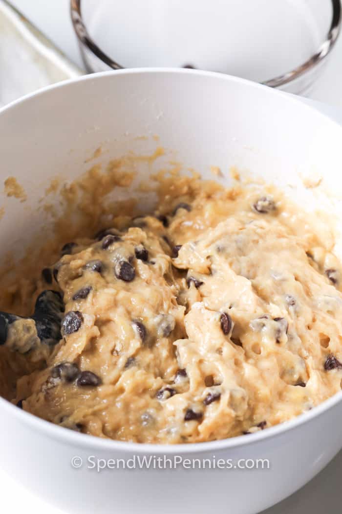 Chocolate Chip Banana Bread ingredients mixed in a white bowl