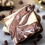 A propped-up square of fudgy cream cheese swirled brownies