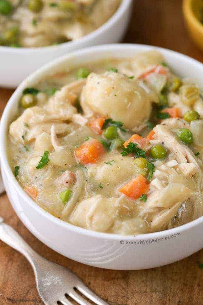 Crock Pot Chicken and Dumplings served in a bowl with parsley on top