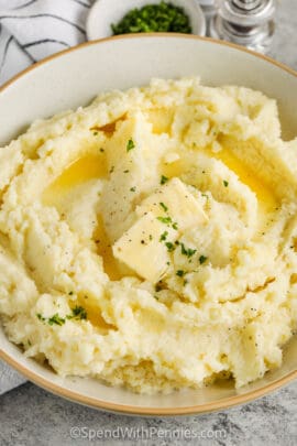 close up of Mashed Parsnips and Turnips with melted butter