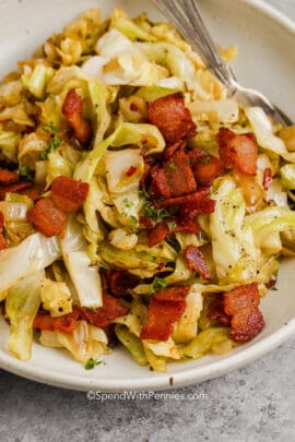 bowl of fried cabbage with bacon