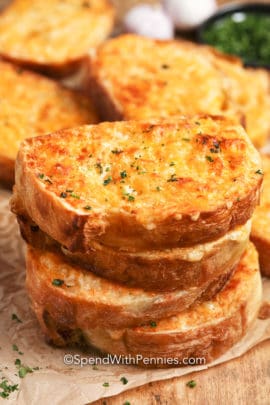 Stack of Garlic Cheese Toast on parchment paper