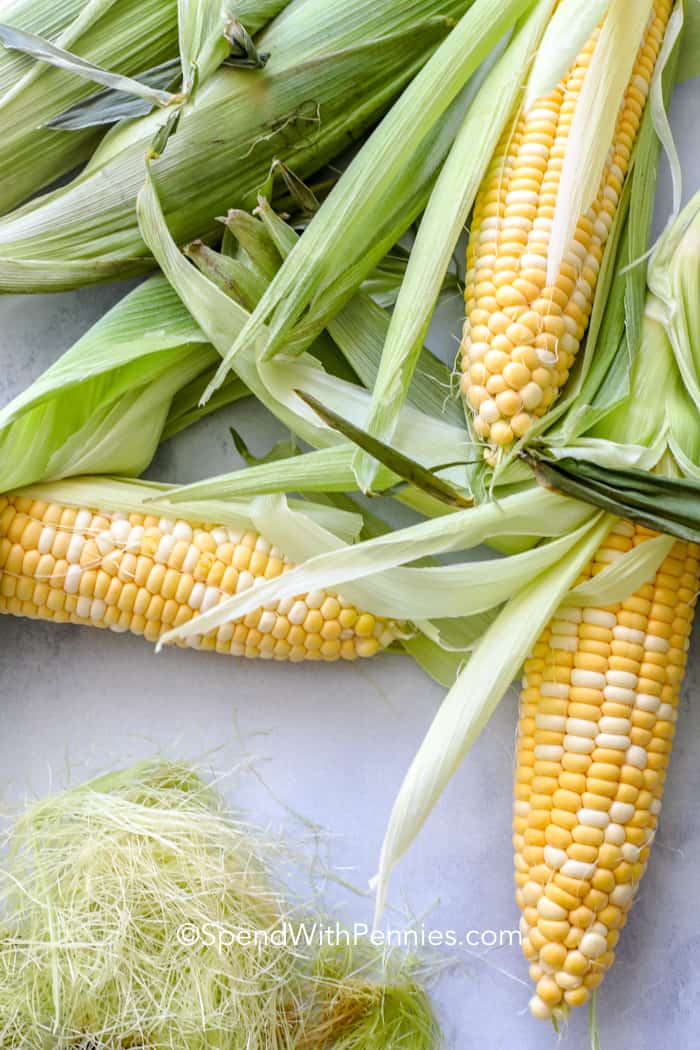 Corn on a table with the silk removed