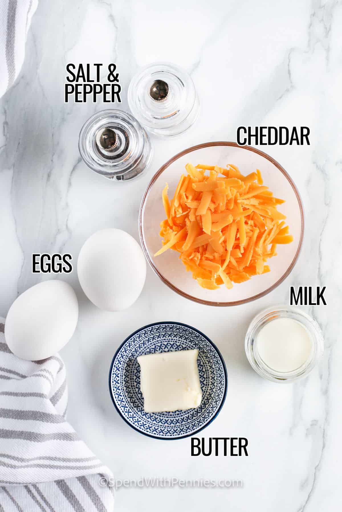 cheddar , eggs , milk , butter , salt and pepper with labels to make How to Make an Omelette