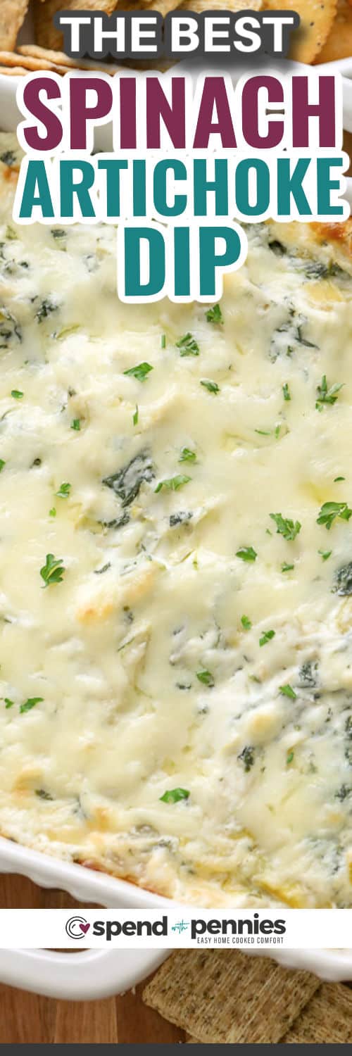 The Best Spinach Artichoke Dip in a dish with writing