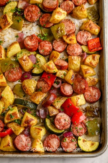 Roasted Sausage and Potatoes on a baking sheet