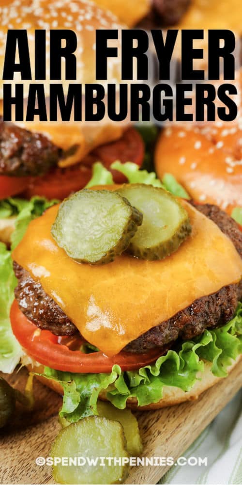 Air Fryer Hamburgers on a bun with pickles and a title