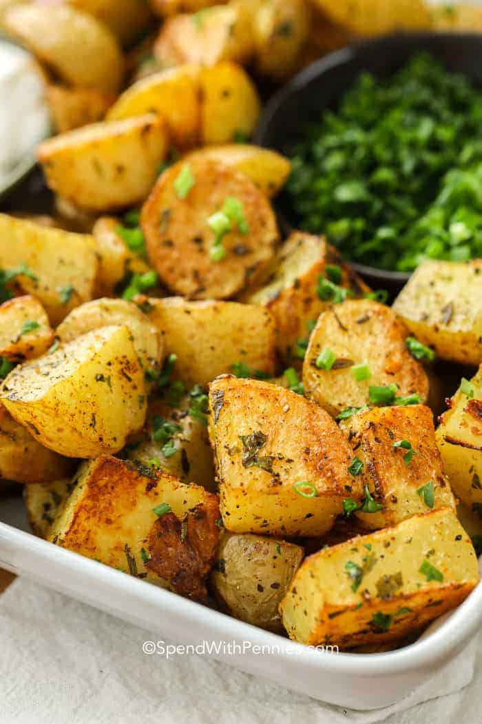 Oven Roasted Potatoes in a serving dish with parsley