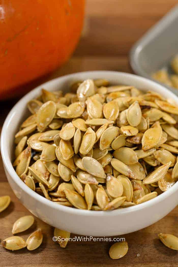 White bowl of Roasted Pumpkin Seeds