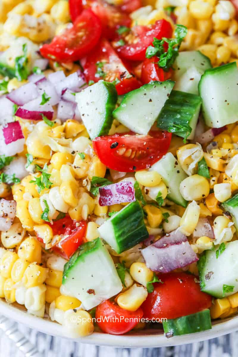fresh corn salad with cucumbers and tomatoes