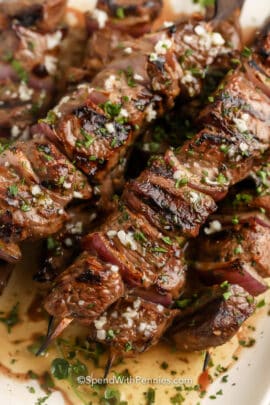 cooked Garlic Steak Kabobs on a plate