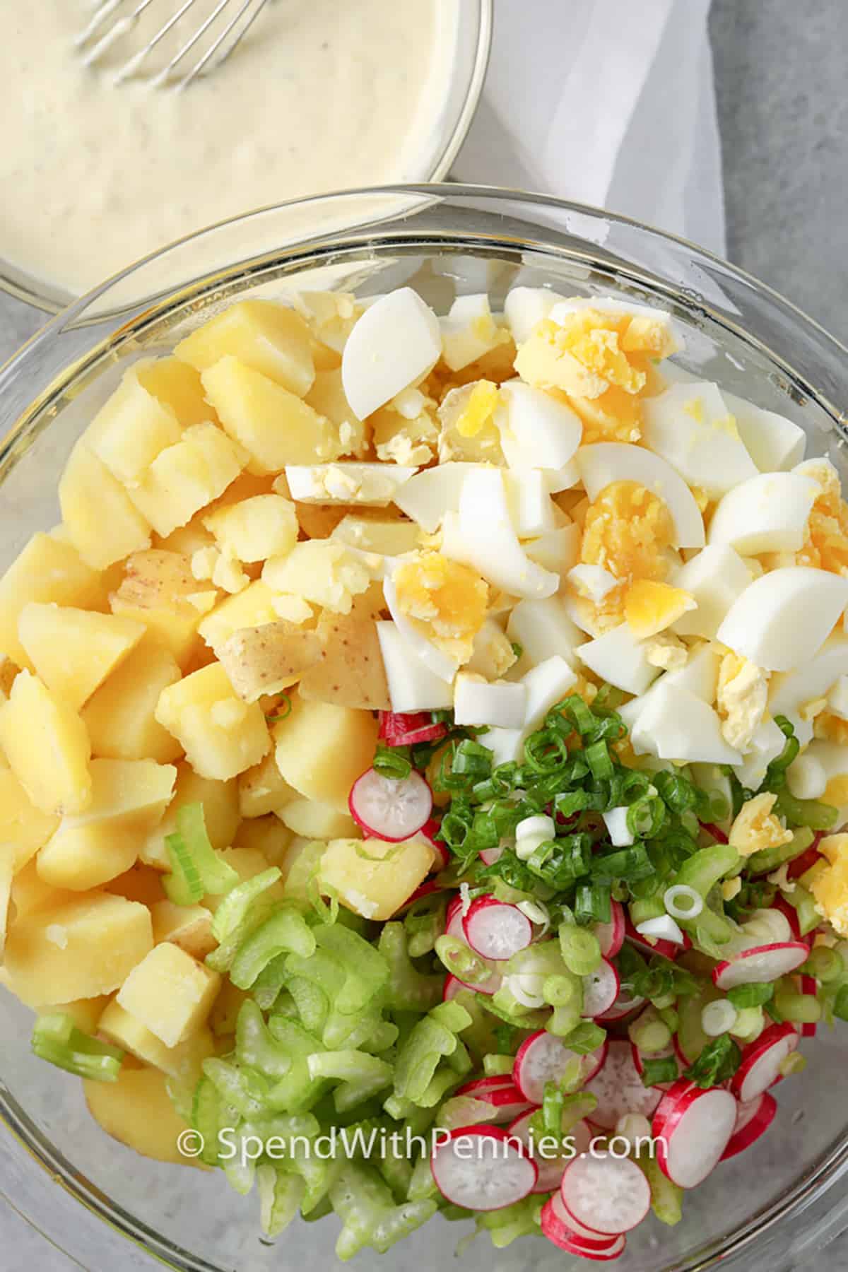 ingredients in a bowl to make The Best Potato Salad